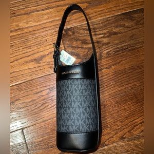 NWT black Michael Kors leather wine bottle holder.